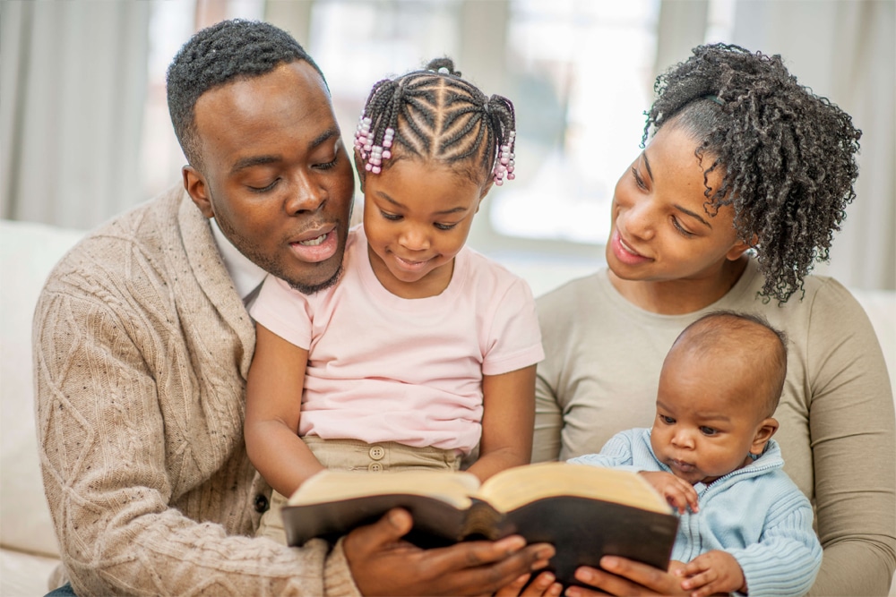 family having a Bible study